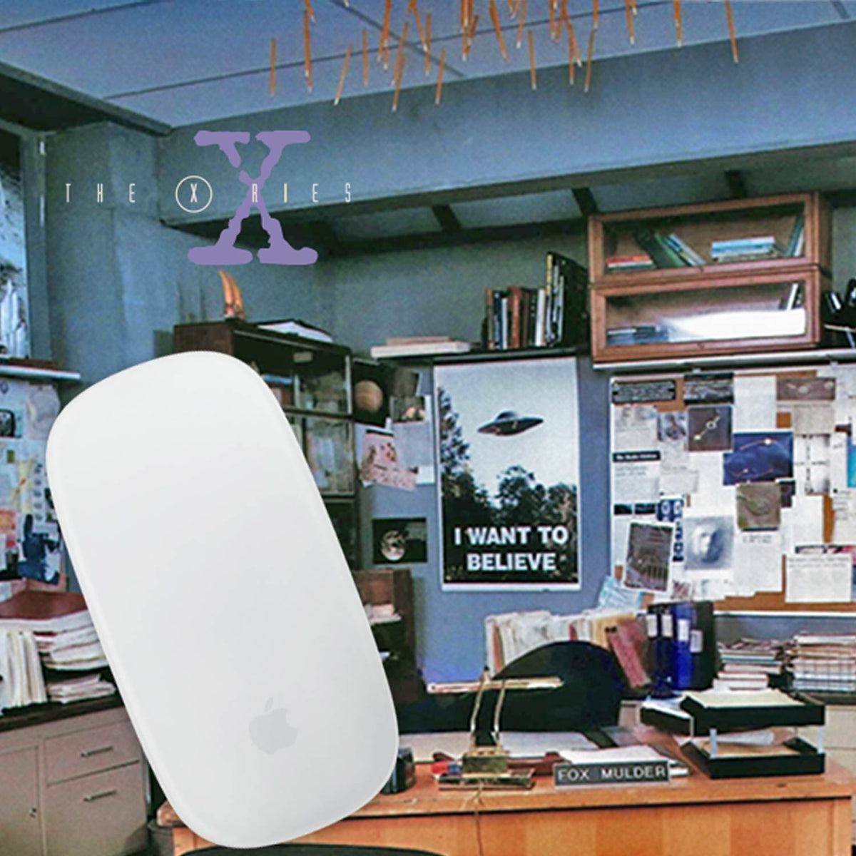 Theories Brand FBI's Most Unwanted Mousepad with computer mouse on top