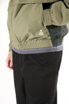 Theories TAILWIND VENTED WINDBREAKER JACKET Olive model detail embroidery