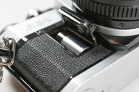 Appareil photo argentique Canon AE-1 vintage 35 mm avec objectif Canon 50 mm F/1.8