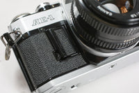 Appareil photo argentique Canon AE-1 vintage 35 mm avec objectif Canon 50 mm F/1.8