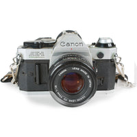 Vintage Canon AE-1 Program 35mm Film Camera Package with 50mm F/1.8 Canon Lens