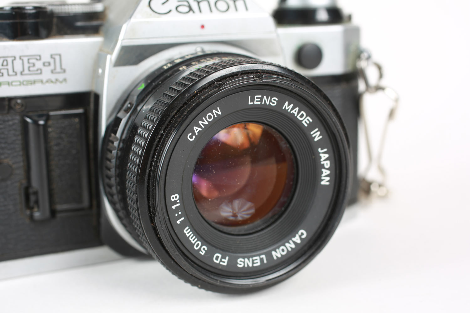 Vintage Canon AE-1 Program 35mm Film Camera Package with 50mm F/1.8 Canon Lens