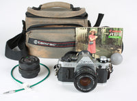 Vintage Canon AE-1 Program 35mm Film Camera Package with 50mm F/1.8 Canon Lens