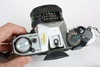 Vintage Canon AE-1 Program 35mm Film Camera Package with 50mm F/1.8 Canon Lens