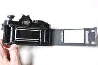 Vintage Nikon FM Black 35mm Film Camera with 50mm F/1.8 Nikon Pancake Lens