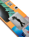 Skateboard deck with artistic design and black and white photo of a person.