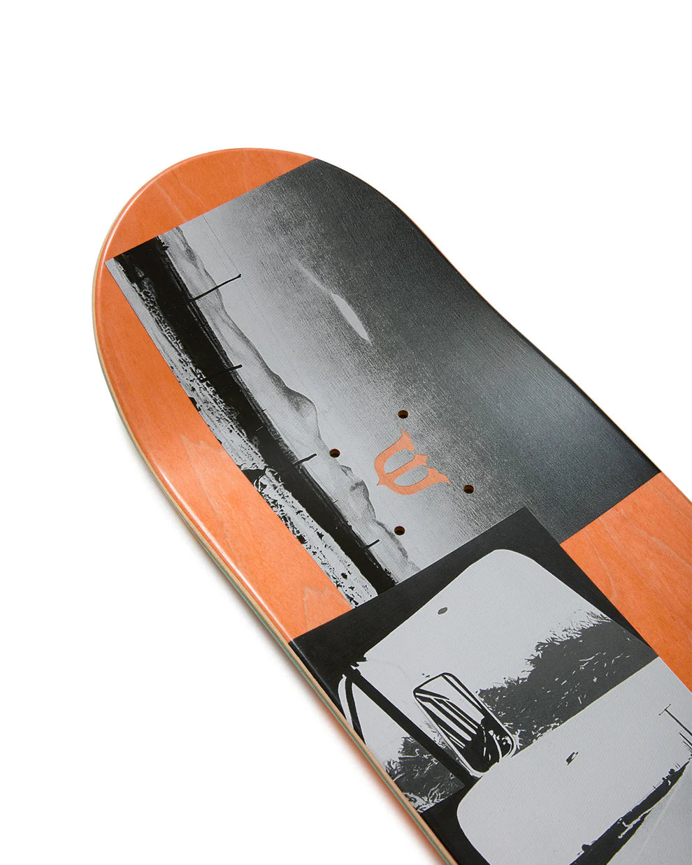 Skateboard deck with black and orange design on a white background