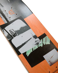 Skateboard deck with artistic design on a white background