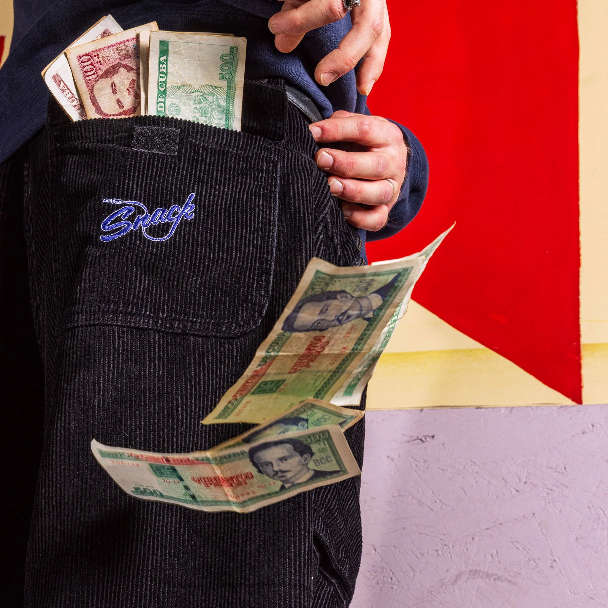 Snack Mic Check Corduroy Pants Black back pocket detail with money falling out