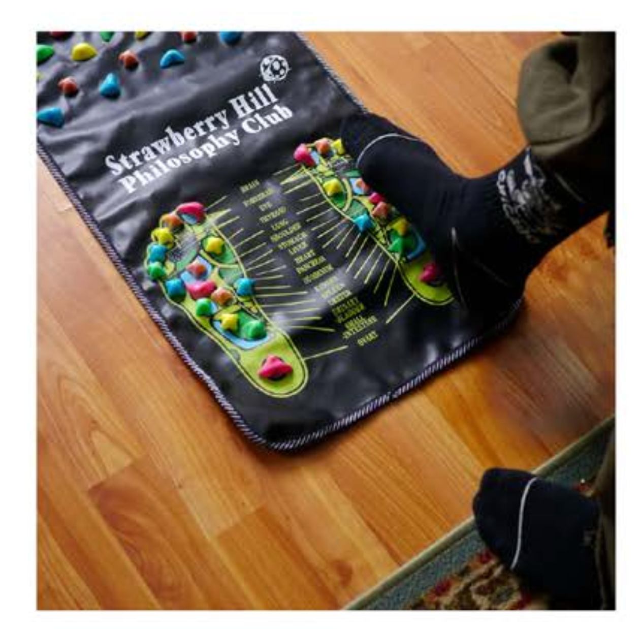 Snack Acupressure Foot Mat in use