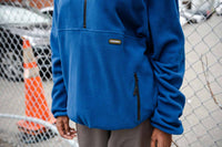 THEORIES CATSKILLS FLEECE PULLOVER BLUE ON MODEL DETAIL